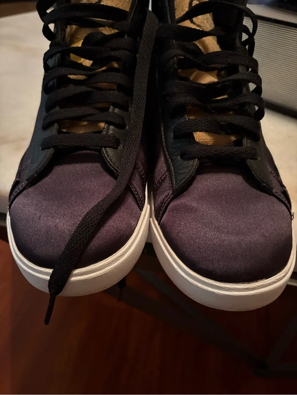 Nike Women's Blaze Black and White Mid-Top Sneaker with Gold Accents